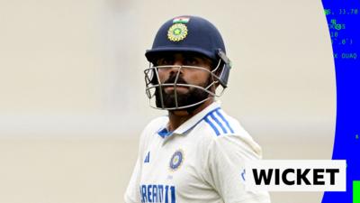 Virat Kohli looks on as he loses his wicket