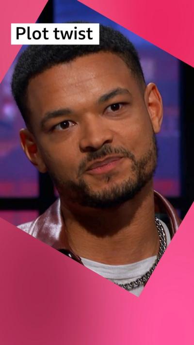 A man, Steven Bartlett, gives a side-eye look; he has short black hair and wears a maroon jacket