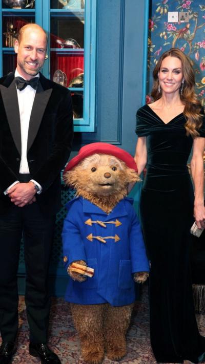 Prince William and Catherine, Princess of Wales, meet the character Paddington Bear as they attend the Royal Variety Performance at the Royal Albert Hall, in London.