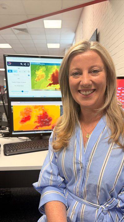 Woman looking and smiling at camera with photos of the weather in the UK in the background
