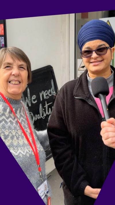 Two women smile to the camera as they are being interviewed. One of them is older than the other.