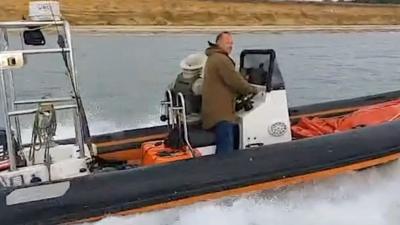 Man on boat.