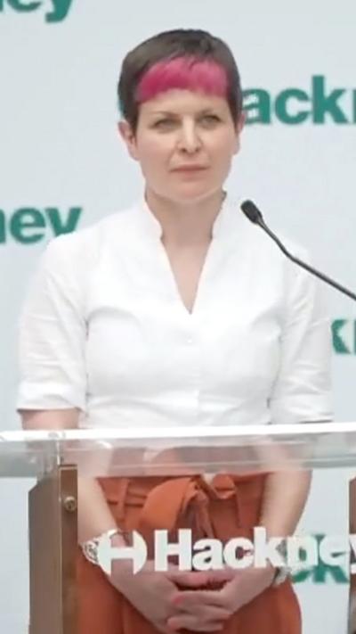 Zoe Garbett at a podium