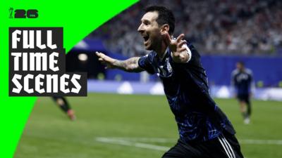 Lionel Messi runs with his arms wide open to celebrate Argentina progressing to 2026 World Cup final