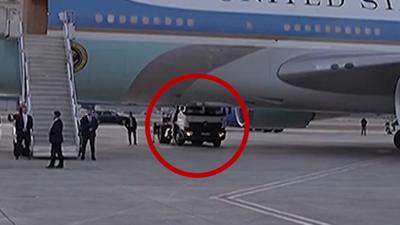 A truck up against Air Force One