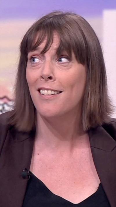 Jess Phillips, who has a brown bob with a fringe and wears a blazer, in the TV studio