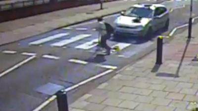 Pedestrian on zebra crossing