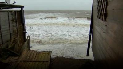 House hanging over cliff at Hemsby