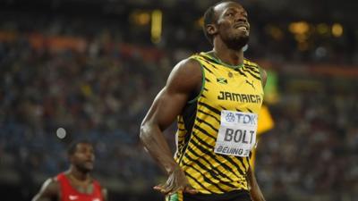 Usain Bolt defends his World Championship 200m title with victory over American Justin Gatlin in Beijing