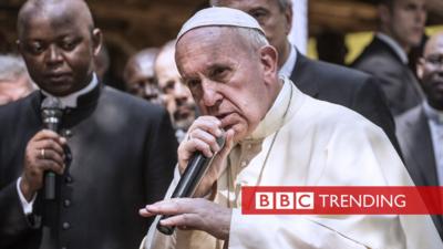Picture of Pope Francis talking into a microphone