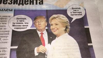 Russian paper with Trump and Clinton