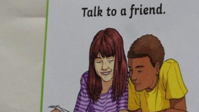 School poster of girl and boy reading