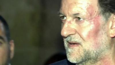 Spanish Prime Minister Mariano Rajoy after he was punched