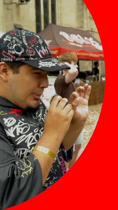 Beatboxer wearing cap 