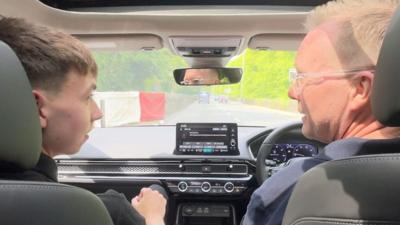 Jorge Halliday and Richard 'Milky' Quayle on a tour of the Mountain Course