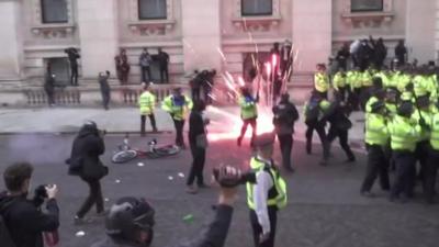 A flare was thrown at the protests