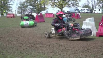 Two drivers in the first race of the Lawnmower racing season.