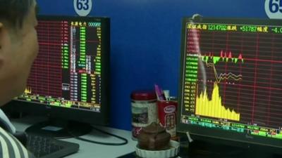 Computers showing Chinese stock market data