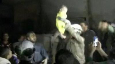 Baby pulled from rubble in Syria