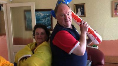 Yolanda and Martyn Fletcher in football gear