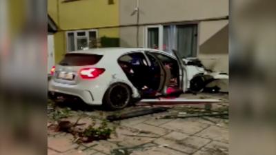 Car crashes into house