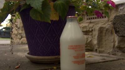 A glass milk bottle