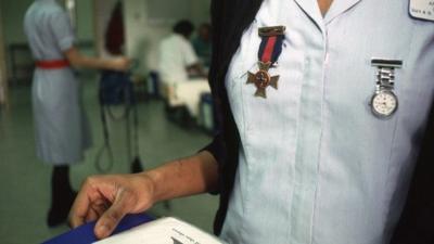 Nurse's badge and watch