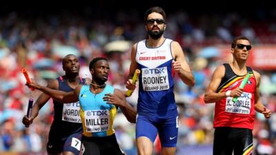 Martyn Rooney runs the final relay leg for Great Britain