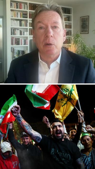 Frank Gardner, with short hair, dressed in a suit in front of a bookcase, above of an image of people celebrating holding Iranian flags