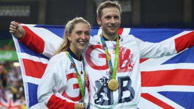 Laura Trott and Jason Kenny pose with GB flag