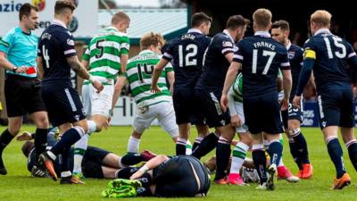 Celtic's Scott Brown fells Ross County's Liam Boyce