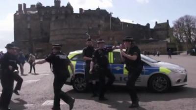 Officers from Police Scotland dancing for the Running Man Challenge