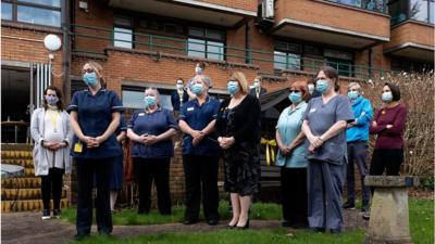 Staff observe minute's silence