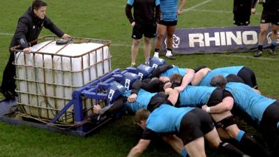 Osprey rugby players practising a scrum