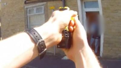 Data in West Yorkshire shows the number of Taser discharges is falling as body-worn camera use increases.