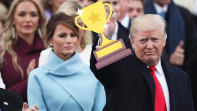 Donald Trump with a trophy superimposed