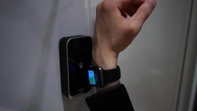 Door being opened with smartwatch