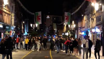 Crowds on St Mary Street in Cardiff ahead of Friday's firebreak lockdown