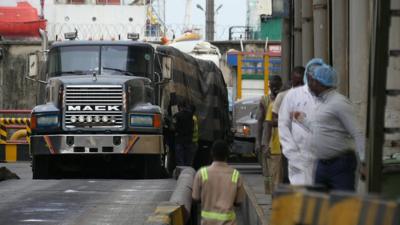 A lorry leaving a wheat manufacturer in Lagos, Nigeria