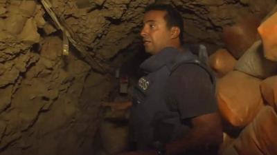 Ahmed Maher inside an underground tunnel in Mosul