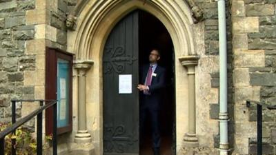 Doors shut at Holy Trinity Church in Llandrindod Wells, Powys