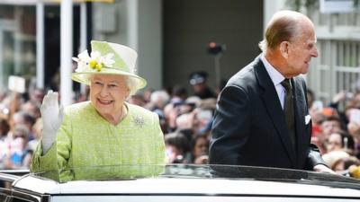 The Queen and Prince Philip great the crowds in Windsor.