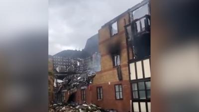 Pictures show the building badly damaged after a gas explosion injured two people.