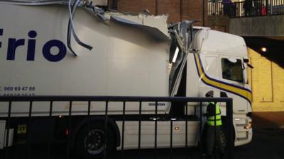 Lorry with shredded trailer