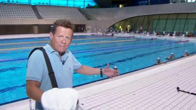 The BBC's Milke Bushell at the London Aquatics Centre