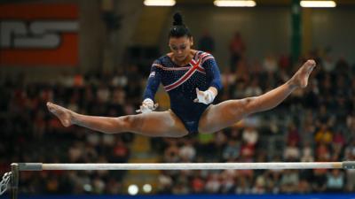 Rebecca Downie wins gold on uneven bars