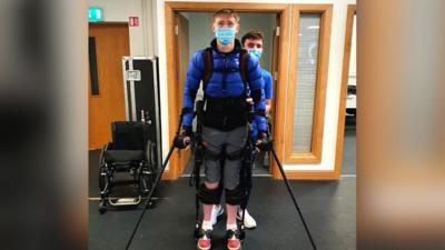 Keen sportsman Jack Kavanagh was paralysed 12 years ago, but an exoskeleton is helping him walk again.