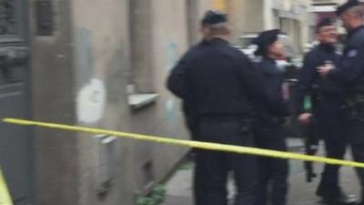 French police outside the raid Saint-Denis flat