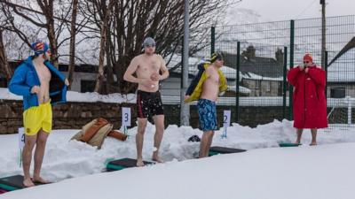 Swimming in the snow in Ullapool.