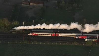 Flying Scotsman and three modern Virgin Trains